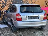 Mazda 323 2002 года за 2 700 000 тг. в Балкашино – фото 4