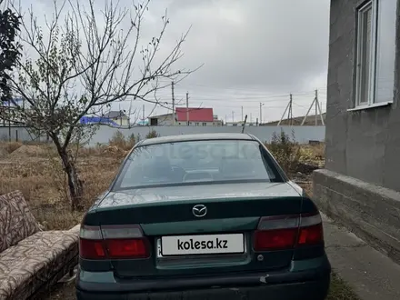 Mazda 626 1998 года за 1 000 000 тг. в Актобе – фото 4