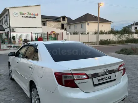 Toyota Camry 2013 года за 7 900 000 тг. в Актау