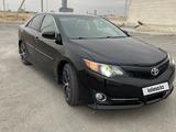 Toyota Camry 2014 года за 8 600 000 тг. в Жанаозен – фото 2