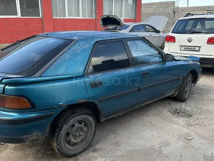 Mazda 323 1992 года за 450 000 тг. в Алматы – фото 4