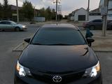 Toyota Camry 2013 года за 7 600 000 тг. в Жанаозен – фото 2