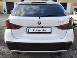 BMW X1 2012 года за 5 300 000 тг. в Актобе – фото 4
