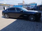 BMW 750 2011 года за 9 000 000 тг. в Астана