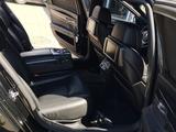 BMW 750 2011 года за 9 000 000 тг. в Астана – фото 4