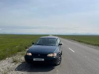 Toyota Carina E 1996 годаfor2 000 000 тг. в Шымкент