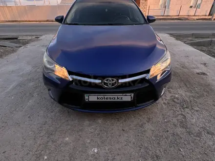 Toyota Camry 2014 года за 8 500 000 тг. в Атырау