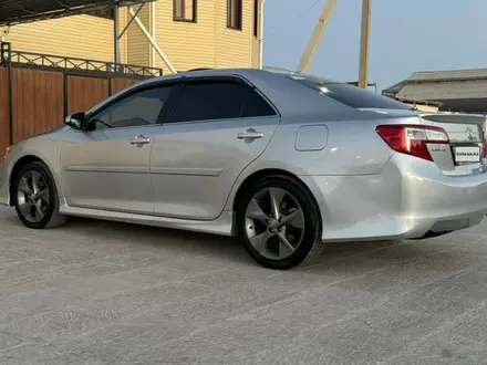 Toyota Camry 2013 года за 8 700 000 тг. в Жанаозен – фото 5