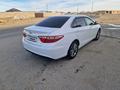 Toyota Camry 2017 года за 7 500 000 тг. в Жанаозен – фото 5