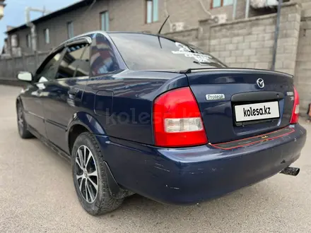 Mazda 323 2000 года за 1 300 000 тг. в Алматы – фото 8