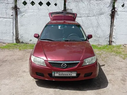 Mazda 323 2003 года за 1 500 000 тг. в Алматы – фото 7