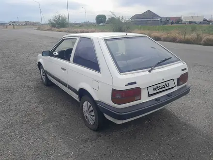 Mazda 323 1989 года за 500 000 тг. в Талдыкорган – фото 6