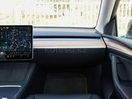 Tesla Model Y 2023 года за 19 300 000 тг. в Алматы – фото 43