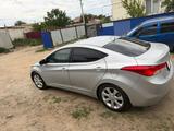 Hyundai Elantra 2013 года за 3 400 000 тг. в Курмангазы – фото 4