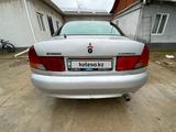 Mitsubishi Carisma 1996 годаүшін800 000 тг. в Шымкент – фото 2