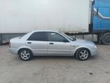 Mazda 323 1999 года за 1 800 000 тг. в Мерке