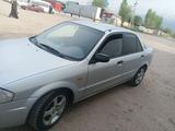 Mazda 323 1999 года за 1 800 000 тг. в Мерке – фото 3