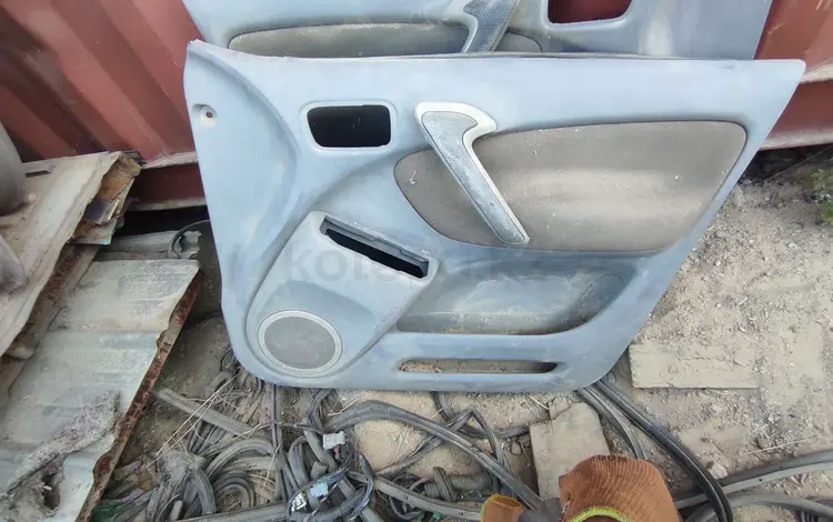 Обшивка двери дверная карта rav4 за 10 000 тг. в Алматы