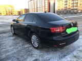 Volkswagen Jetta 2015 года за 4 100 000 тг. в Актобе – фото 3