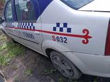 Renault Logan 2013 года за 600 000 тг. в Астана – фото 2