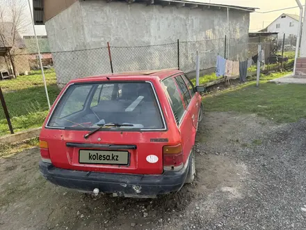 Mazda 323 1989 года за 400 000 тг. в Алматы – фото 4
