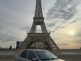 Renault Logan 2013 года за 2 200 000 тг. в Уральск – фото 3