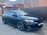 Toyota Camry 2012 года за 7 200 000 тг. в Актобе
