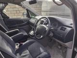 Toyota Alphard 2003 года за 6 300 000 тг. в Уральск – фото 2