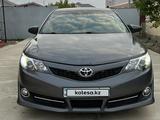 Toyota Camry 2013 года за 7 800 000 тг. в Атырау