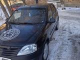 Renault Logan 2011 года за 650 000 тг. в Караганда – фото 3