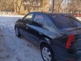 Renault Logan 2011 года за 650 000 тг. в Караганда – фото 4