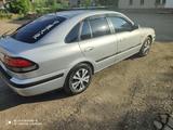 Mazda 626 1997 года за 2 700 000 тг. в Астана – фото 3