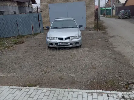 Mitsubishi Carisma 1995 года за 1 500 000 тг. в Атырау – фото 2