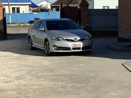 Toyota Camry 2013 года за 5 500 000 тг. в Атырау