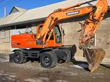 Doosan  DX140W 2013 годаfor33 000 000 тг. в Шымкент – фото 2