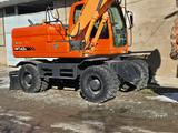 Doosan  DX140W 2013 года за 28 000 000 тг. в Шымкент