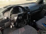 Mazda 323 2002 года за 1 800 000 тг. в Усть-Каменогорск – фото 3