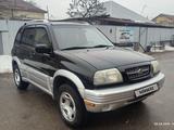 Suzuki Grand Vitara 1999 годаүшін3 600 000 тг. в Алматы