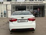 Kia Rio 2012 года за 4 219 798 тг. в Алматы – фото 4