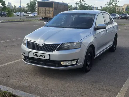 Skoda Rapid 2013 года за 2 950 000 тг. в Астана – фото 2