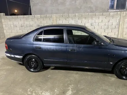 Toyota Carina E 1995 года за 1 500 000 тг. в Шымкент – фото 10