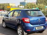 Renault Sandero 2015 года за 2 900 000 тг. в Актобе – фото 4