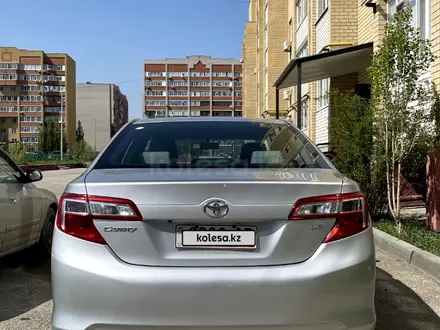 Toyota Camry 2014 года за 6 200 000 тг. в Актобе – фото 4