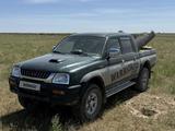 Mitsubishi L200 2006 годаүшін3 950 000 тг. в Шымкент – фото 4