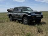 Mitsubishi L200 2006 годаүшін3 950 000 тг. в Шымкент