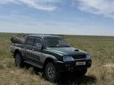 Mitsubishi L200 2006 годаүшін3 950 000 тг. в Шымкент – фото 2