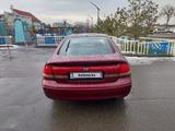 Mazda 626 1997 года за 1 650 000 тг. в Узынагаш – фото 4