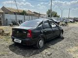 Renault Logan 2013 года за 888 888 тг. в Атырау – фото 2