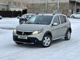 Renault Sandero 2014 годаүшін4 200 000 тг. в Актобе