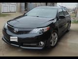 Toyota Camry 2013 года за 8 800 000 тг. в Шымкент